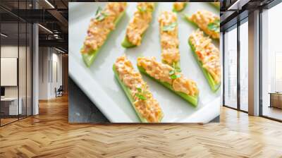 Celery sticks or boats with pimento cheese and cilantro Wall mural