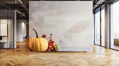 Decorative pumpkins on marble table, fall centerpiece for Thanksgiving, generative AI Wall mural