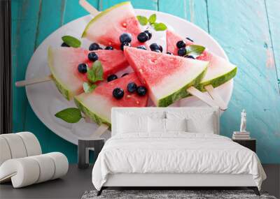 Fresh watermelon popsicles with blueberries Wall mural