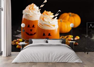 Halloween cold cocktail or drink with jack o'lantern face Wall mural