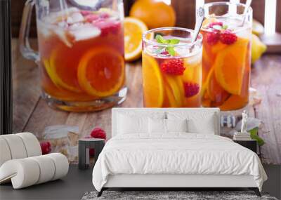 Iced tea with orange and raspberry Wall mural