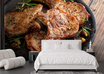 Pork chops grilled or seared bone in on a serving plate Wall mural