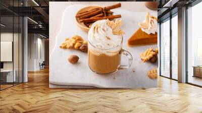 Pumpkin spice latte topped with whipped cream and cinnamon Wall mural