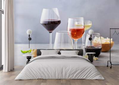 Red, white wine and rose in different glasses Wall mural