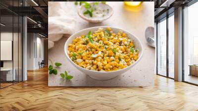 Sauteed yellow and white corn with herbs, healthy side dish idea Wall mural