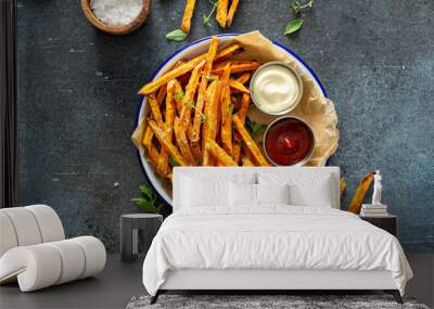 Sweet potato fries with mayo and ketchup, homemade roasted in the oven Wall mural