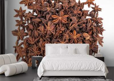 A close-up of a pile of star anise, a popular spice used in Asian cuisine and for medicinal purposes. Wall mural