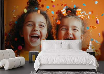 Excited Children Celebrating Halloween with Candy Corn and Confetti, Captured Against an Orange Background for a Vivid and Joyful October Portrait Wall mural