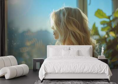 Green Home concept with relaxed stylish woman with long wavy white hair in modern sunny day at home Wall mural