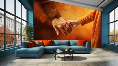 Hands of a little girl and elderly woman holding hands on an autumn background Wall mural