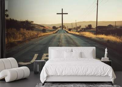 Jesus written on a country road with a cross in the background. Wall mural