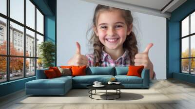 girl showing thumbs up Wall mural