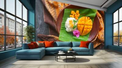 mango sticky rice is Thai dessert made of sticky rice, mango and coconut milk. Wall mural