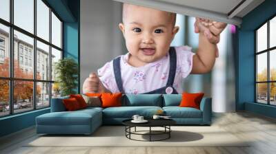 close-up of malay toddler learning to walk Wall mural