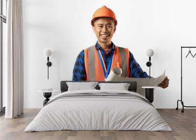 Young Asian male construction worker opening a scroll of blueprints, industrial and construction concepts, isolated white background. Wall mural