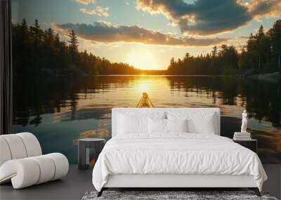 Kayaking in Northwest Ontario, Canada, at dusk on a serene lake. Wall mural