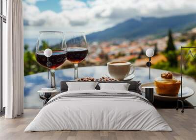 With a view of Funchal town, Madeira, Portugal, the cafe serves two glasses of Madeira wine, two cups of freshly made espresso coffee, and the traditional Portuguese honey and nut dessert Wall mural