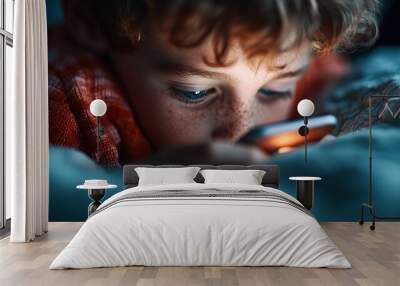 A young child in an orange checkered shirt appears absorbed in something closely, with only part of their face visible, surrounded by deep blue hues in an intimate setting. Wall mural