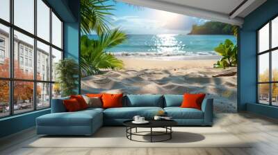 Glimpse of a sunny beach with sparkling ocean water framed by lush tropical foliage and a sandy foreground Wall mural