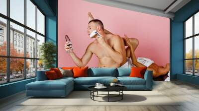 morning routine: the guy shaving and the girl Wall mural