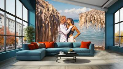 Sexy couple. Couple. Sea background. Life. Dream. Fashion concept. Kiss. Kissing. Wall mural