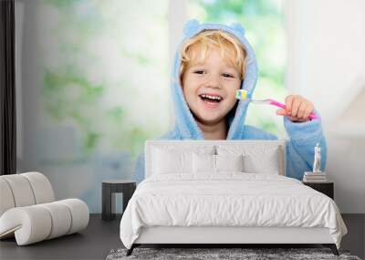 Child brushing teeth. Kids tooth brush. Wall mural