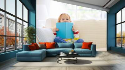 Child reading book. Kids read books. Wall mural