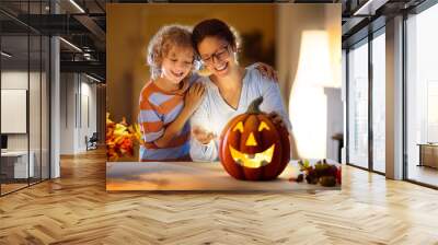 Family carving pumpkin for Halloween Wall mural