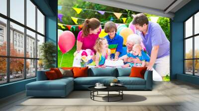 happy young family with grandmother at birthday party Wall mural