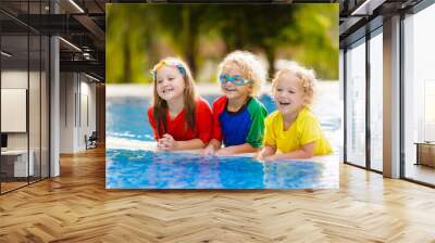 Kids in swimming pool. Children swim. Family fun. Wall mural