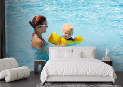 Mother and baby in swimming pool Wall mural