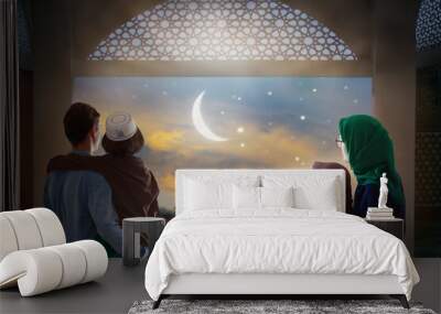 Ramadan Kareem greeting. Family looking at mosque. Wall mural