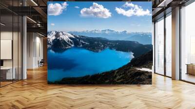 Panoramic view of mountains and turquoise coloured lake in Garibaldi provincial park, BC, Canada. snow mountains and blue sky. Wall mural