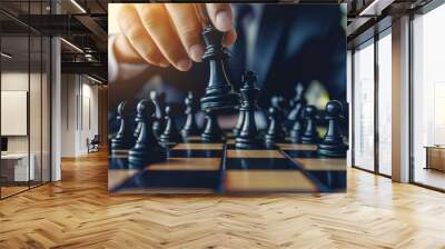 businessman moves chess strategy in competition, strategy, management or successful leadership game concept Wall mural