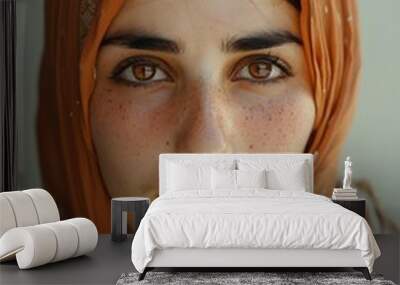 A young Arab woman with a veil on her head Wall mural