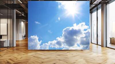 The bright scorching sun and cumulus clouds. Background. Scenery. Wall mural