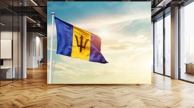 Barbados national flag cloth fabric waving on the sky - Image Wall mural