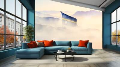 Nauru flag disappears in beautiful clouds with fog. Wall mural