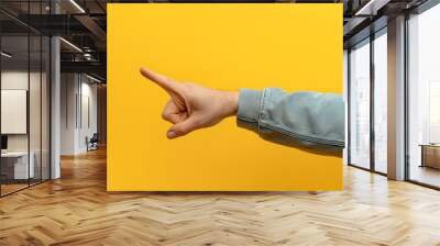 Arm and hand of caucasian man over yellow isolated background snapping fingers for success, easy and click symbol gesture with hand.  Wall mural