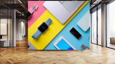 Different modern devices on color background.  Wall mural