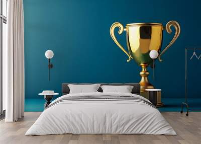 gold winner cup on blue background.  Wall mural