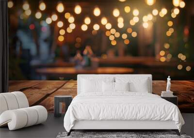 image of wooden table in front of abstract blurred background of resturant lights Wall mural