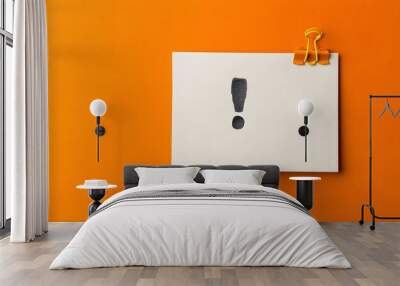 Note paper with exclamation mark on panoramic orange background.  Wall mural