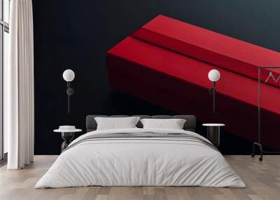 Red gift box on black background. Wall mural