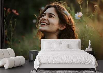 Side view of young woman in floral dress laughing. Wall mural