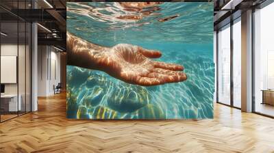 man hand immersed in the water sea, clear limpid water, summer time, romantic view Wall mural