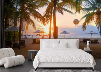 Stunning beautiful sunlight beach with relaxing scenery on a beach. Famous travel destination in Sanur, Bali, Indonesia. Wall mural