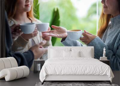 Closeup image of people enjoyed talking and drinking coffee together Wall mural