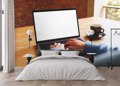 Mockup image of a woman using and typing on laptop computer with blank white desktop screen Wall mural