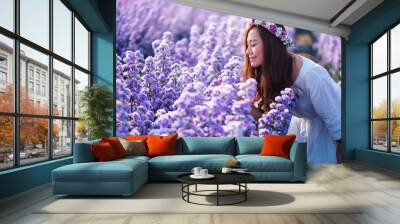 Portrait image of an asian woman in a beautiful Margaret flower field Wall mural